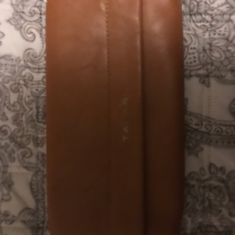 Wristlet with 8 card slots .